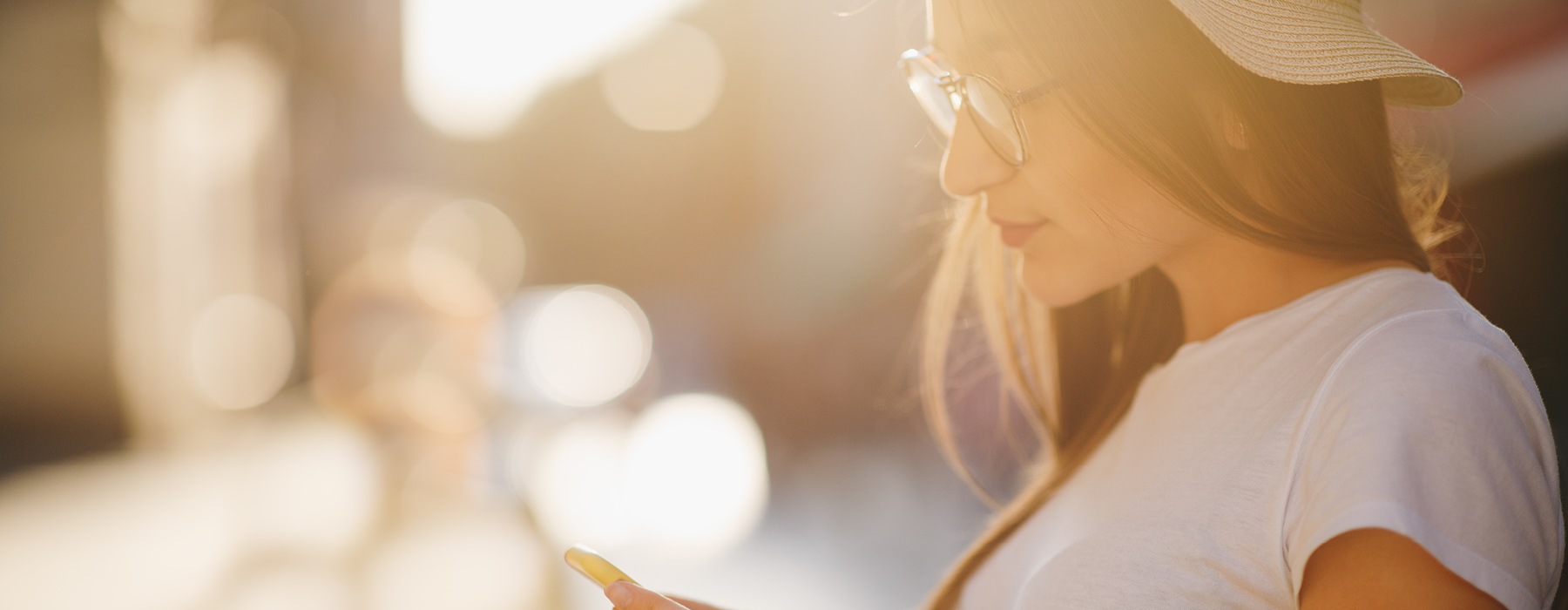 Woman scrolling on her cell phone