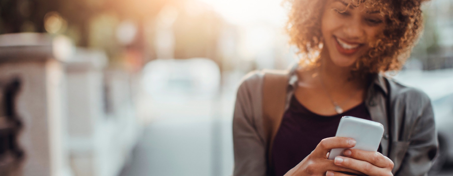 Woman scrolling on her cell phone